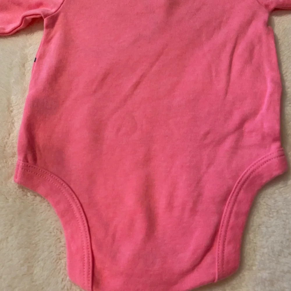 NWOT Baby girl Long Sleeve onesie size 0-3M